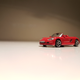 Illustration for article titled Makeitfit Monday: Rennsport Reunion Edition - Malibu International 1:87 Porsche Carrera GT
